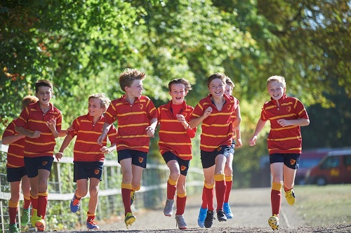 Image representing the Sports curriculum at Moulsford School, featuring students participating in various sports activities and competitions.