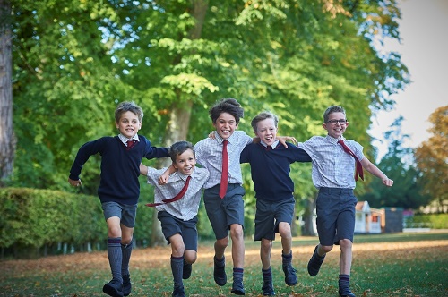 Image showcasing why Moulsford School is chosen, featuring students engaged in various activities and highlighting the school's values, community, and educational approach.
