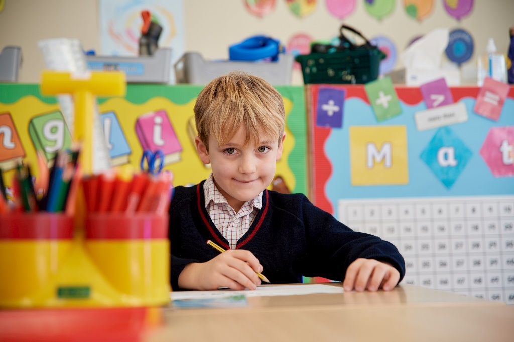 Pre-prep student engaged with drawing in an art class